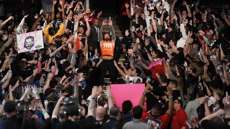 Jey Uso celebrates in the crowd on "WWE Raw."