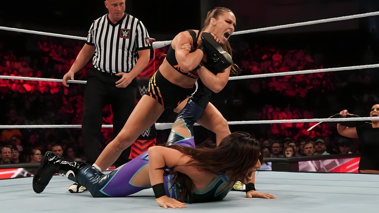 Ronda Rousey with ankle lock on Raquel Rodriguez