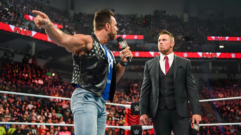 LA Knight pointing and talking to The Miz