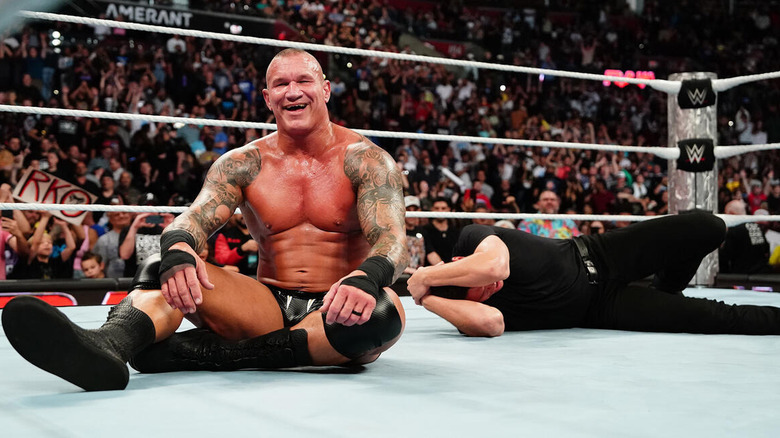 Randy Orton grinning after hitting RKO on GUNTHER