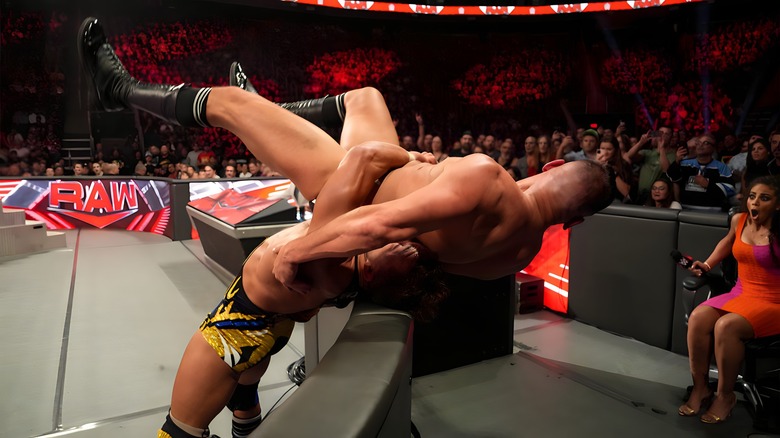 Chad Gable suplexing GUNTHER over the barricade