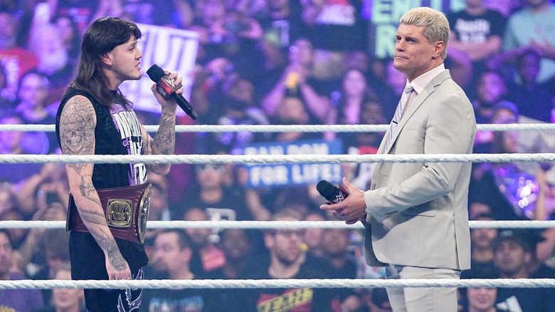 Dominik Mysterio talking to Cody Rhodes