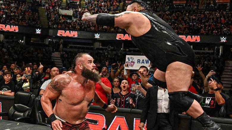 Braun Strowman being attacked by Bronson Reed