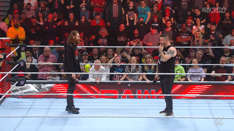 Zayn and Owens in the ring