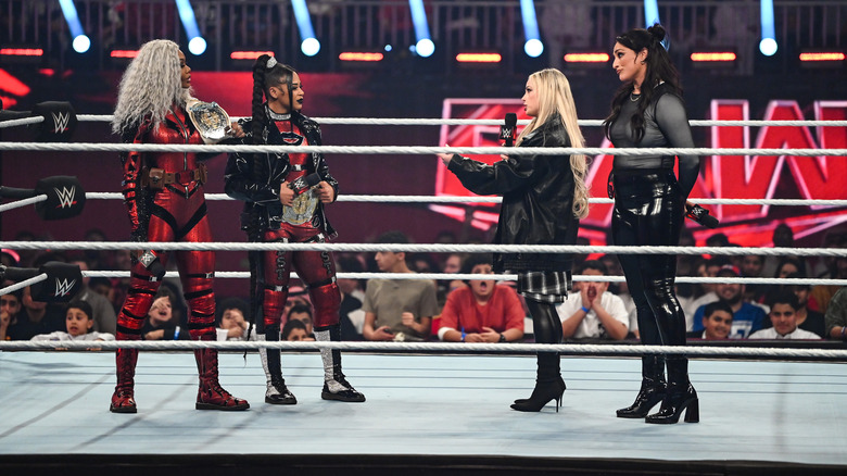 Cargill, Belair, Morgan, and Rodriguez in the ring speaking