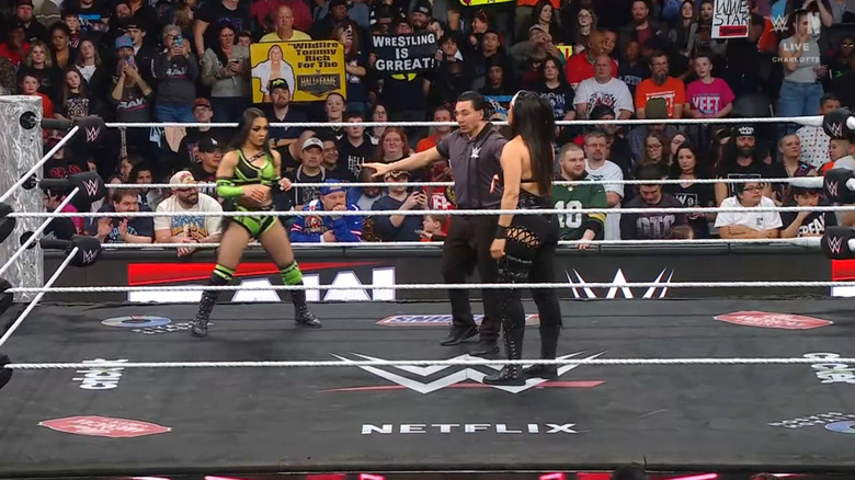 Perez and Rodriguez staring each other down in the ring