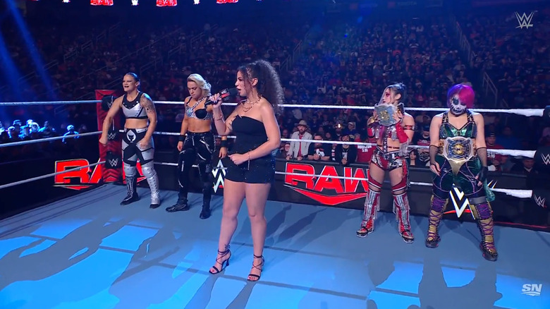 The Kabuki Warriors, Baszler, Asuka, and Samantha Irvin in the ring