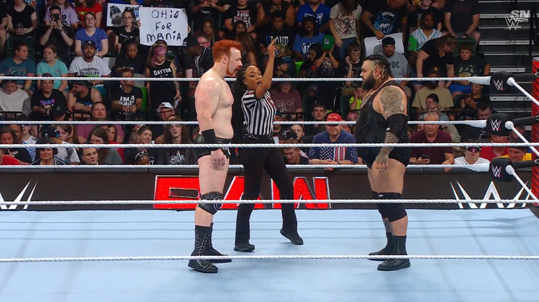 Sheamus and Reed staring one another down