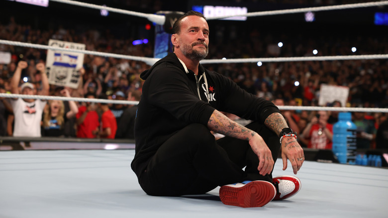 Punk sitting in the ring
