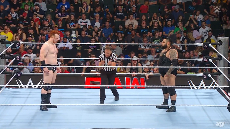 Sheamus and Reed staring one another down