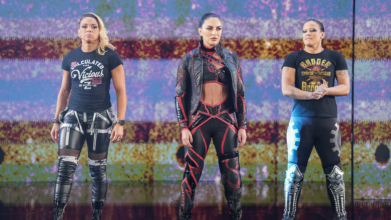 Stark, Deville, and Baszler on the entrance ramp