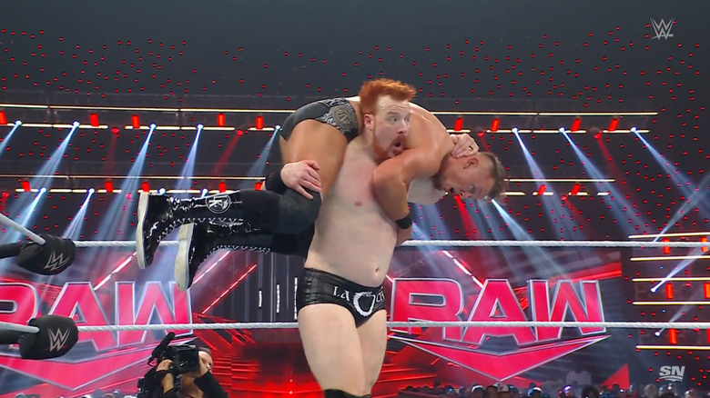 Sheamus with Kaiser on his shoulders