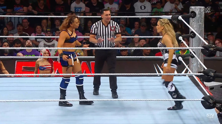 Stark and Natalya staring each other down