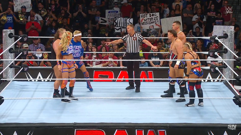 The six competitors in the ring staring each other down