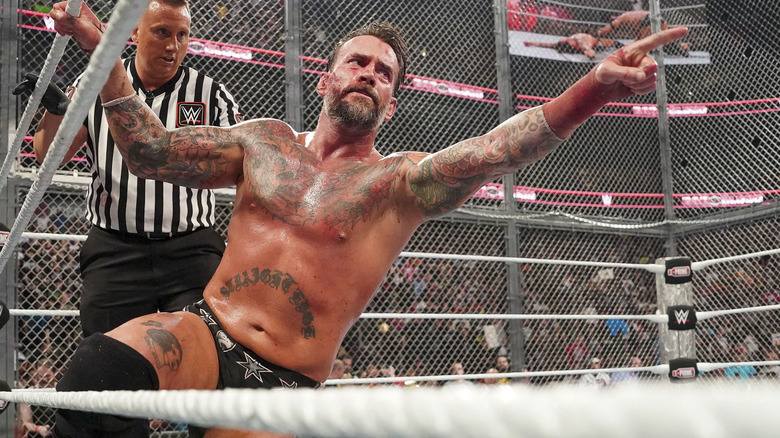 CM Punk points from inside Hell in a Cell at WWE Bad Blood