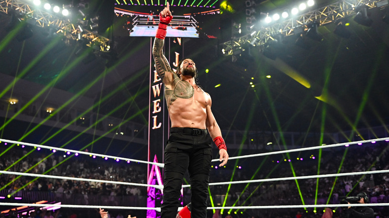 Roman Reigns raises a finger in the air at WWE Crown Jewel