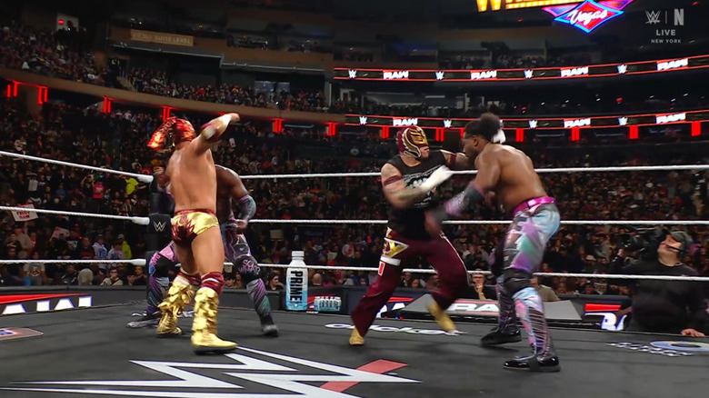 The four men brawling in the ring