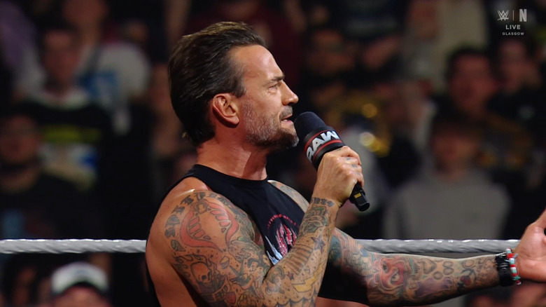 Punk speaking on the mic