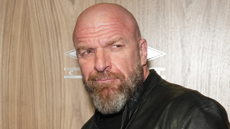 Triple H posing