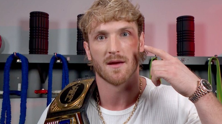 Logan Paul shows off his black eye, courtesy of Kevin Owens.