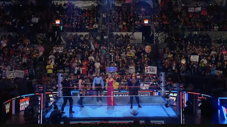 Ripley and Jax standing inside the ring