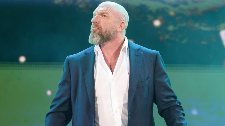 Triple H wearing a suit