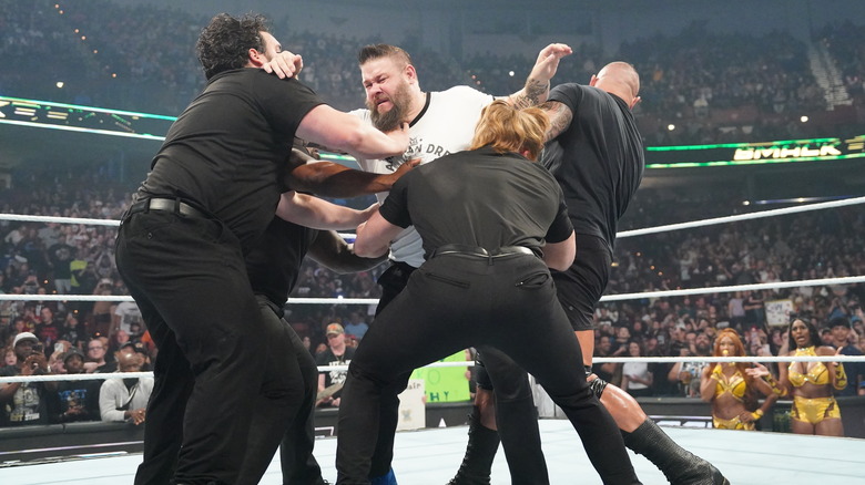 Kevin Owens fights through security