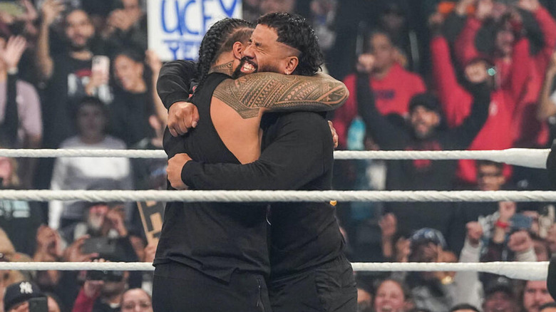 Jey and Jimmy Uso hug it out