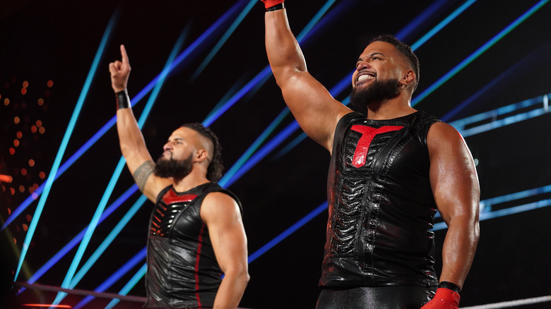 Tama Tonga and Tanga Loa raising their fingers