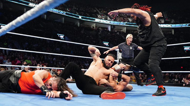 Jacob Fatu and Tama Tonga beat up LA Knight during his match with Shinsuke Nakamura on "WWE SmackDown."