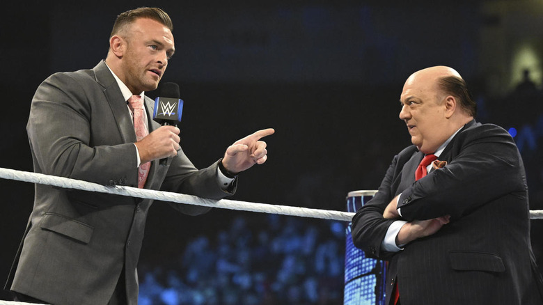 Nick Aldis points at Paul Heyman