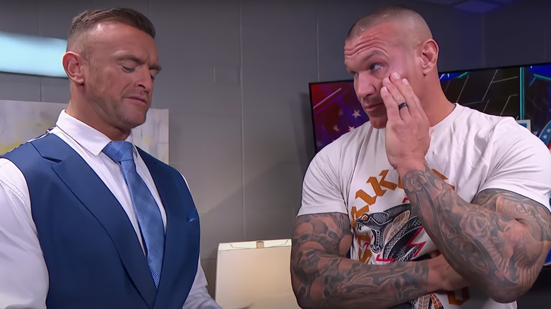 Nick Aldis talking to Randy Orton