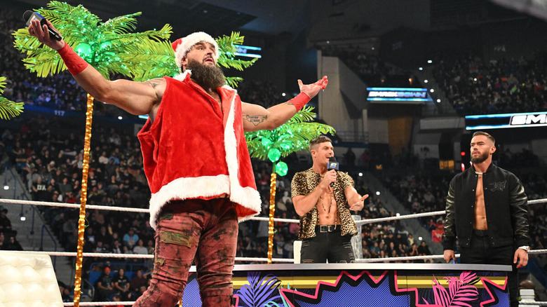 Braun Strowman dressed as Santa alongside Grayson Waller and Austin Theory on "WWE SmackDown."