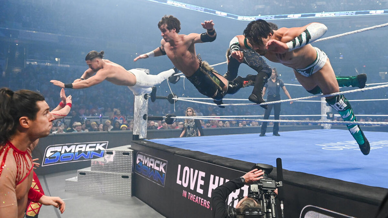 Chris Sabin and Los Garza dive through the ropes to the outside onto Pretty Deadly on "WWE SmackDown."