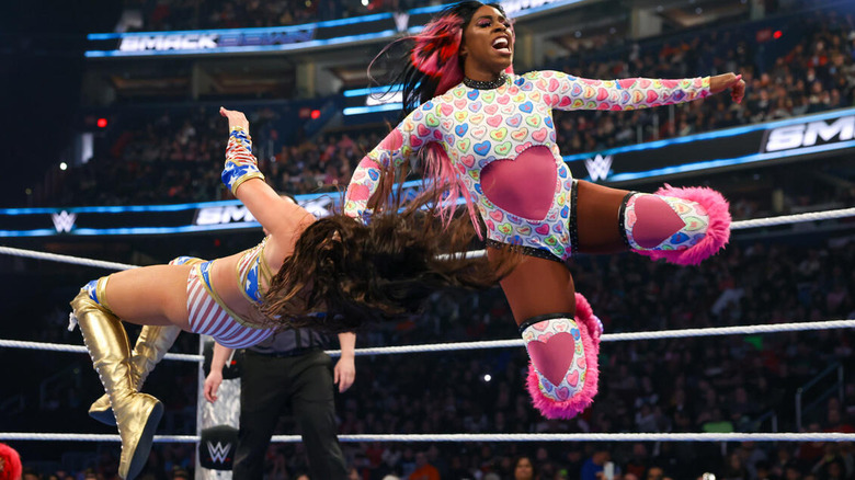 Naomi takes down Chelsea Green with a flying clothesline