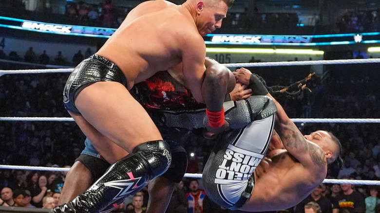 The Miz and Carmelo Hayes hit a double team move on R-Truth on "WWE SmackDown"