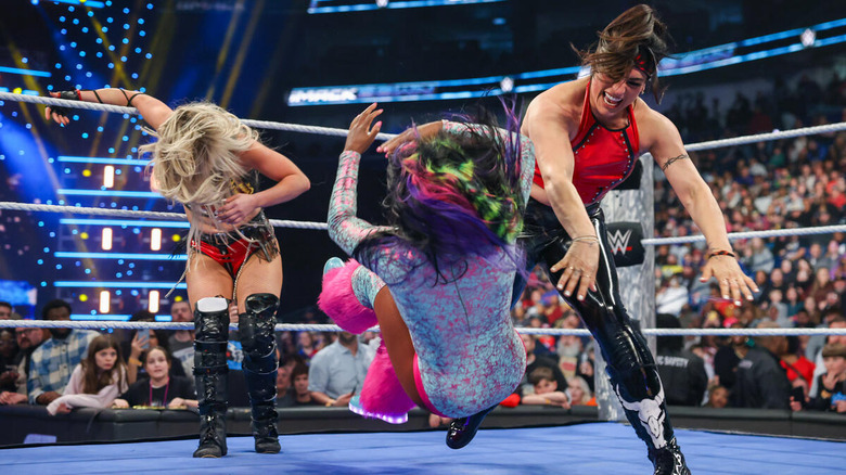 Liv Morgan and Raquel Rodriguez drop Naomi in the ring on "WWE SmackDown"