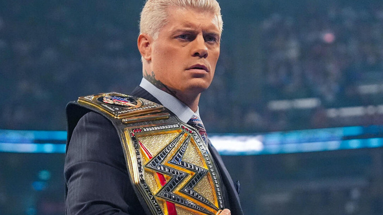 Cody Rhodes holding the WWE title belt on "WWE SmackDown"