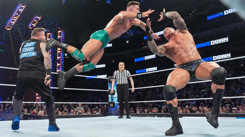 Kevin Owens and Randy Orton deliver a Pop Up RKO to Austin Theory
