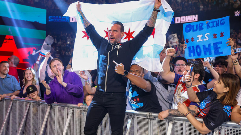 CM Punk raises Chicago flag