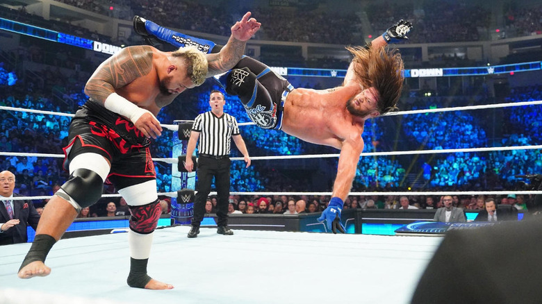 AJ Styles kicking Solo Sikoa