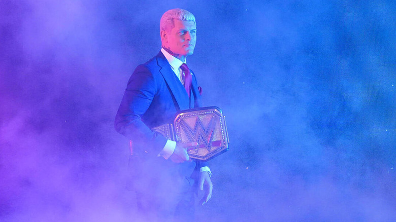 Cody Rhodes holding title