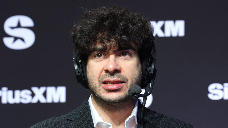 Tony Khan on a headset