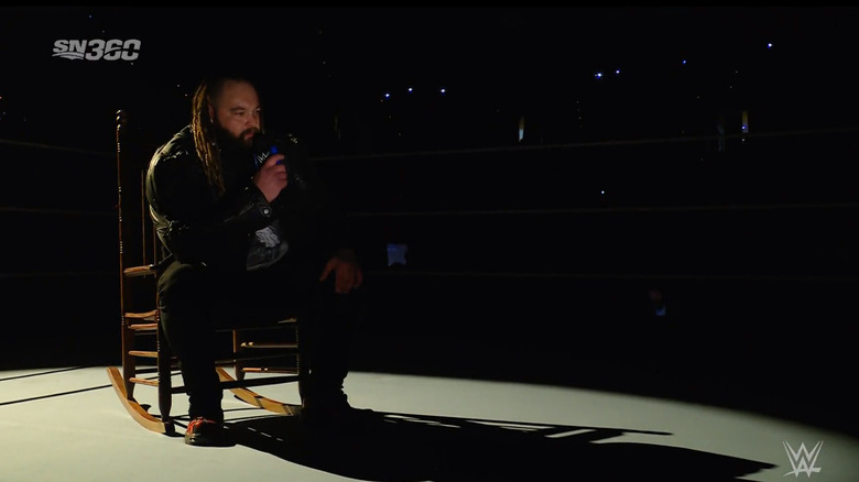 Wyatt sitting in the ring