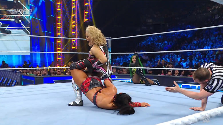 Natalya with the Sharpshooter locked in