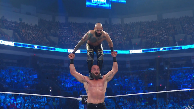 Ricochet on Strowman's shoudlers