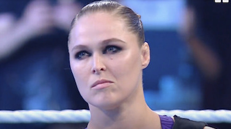 Rousey smirking in the ring