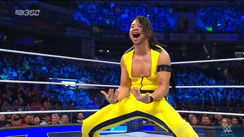 Nakamura hitting his signature pose in the ring