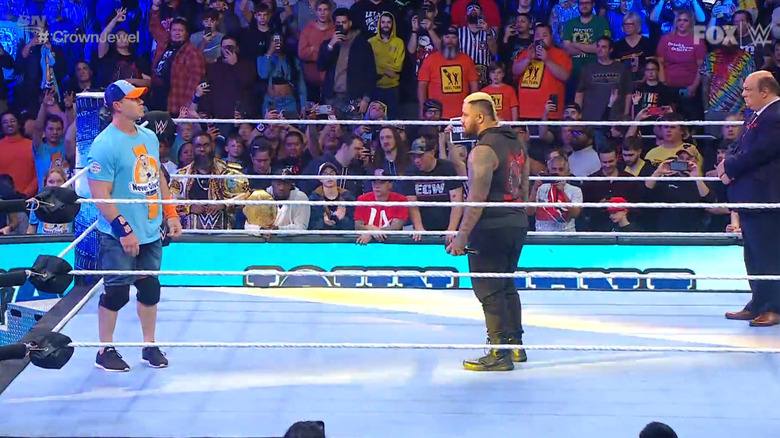 Sikoa, Cena, and Heyman in the ring