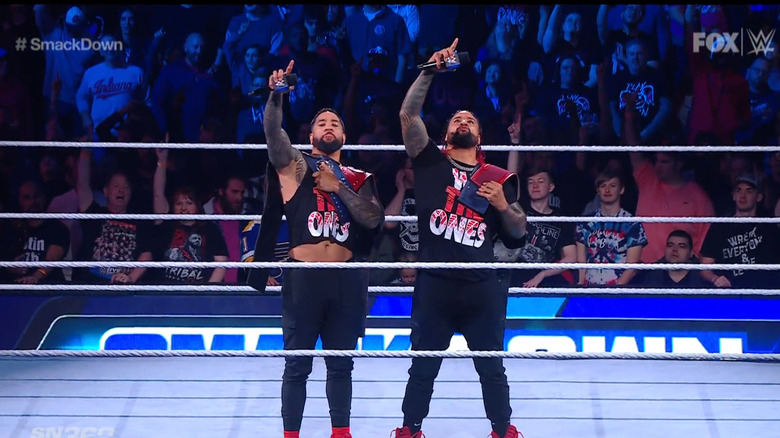 The Usos in the ring holding their signature pose